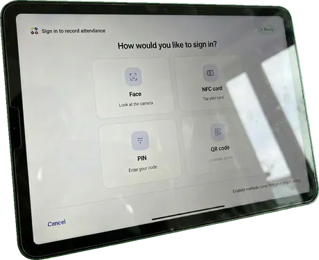 Shared tablet kiosk showing sign-in options: face, NFC card, PIN or QR code